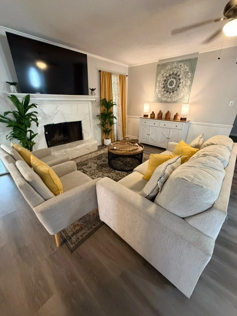 Living room with mantel TV